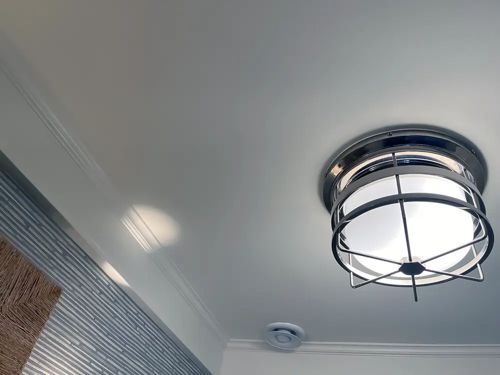 Ceiling after drywall repair — smooth, seamless finish